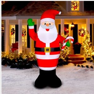 9 foot inflatable Santa. New in box!